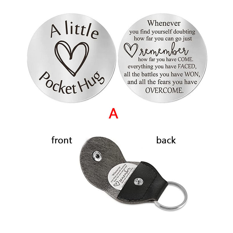 A small pocket Hug engraved key chain round stainless steel metal accessories