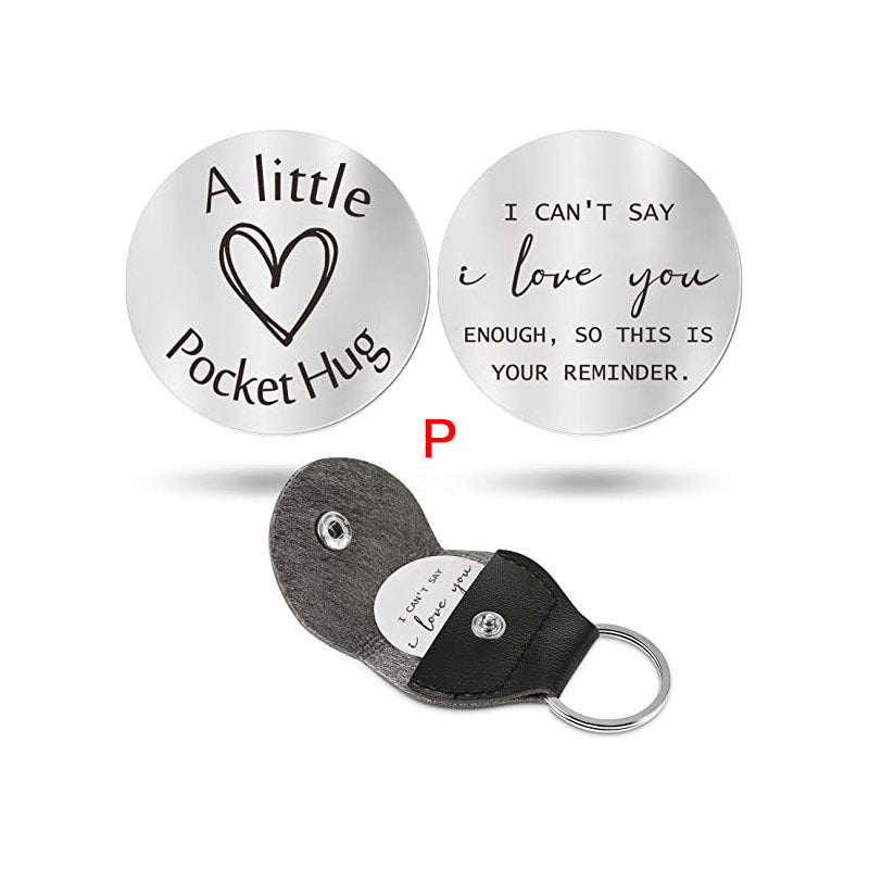 A small pocket Hug engraved key chain round stainless steel metal accessories