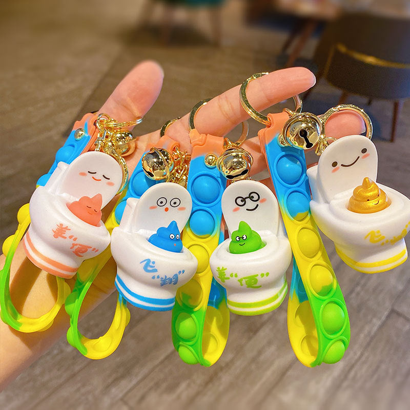 Creative Funny Squeeze Toilet String Clip Keychain Female Cartoon Car Key Chain Schoolbag Pendant Small Gift