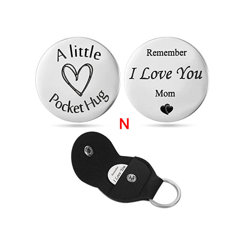 A small pocket Hug engraved key chain round stainless steel metal accessories