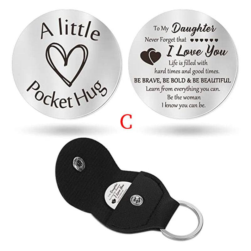 A small pocket Hug engraved key chain round stainless steel metal accessories