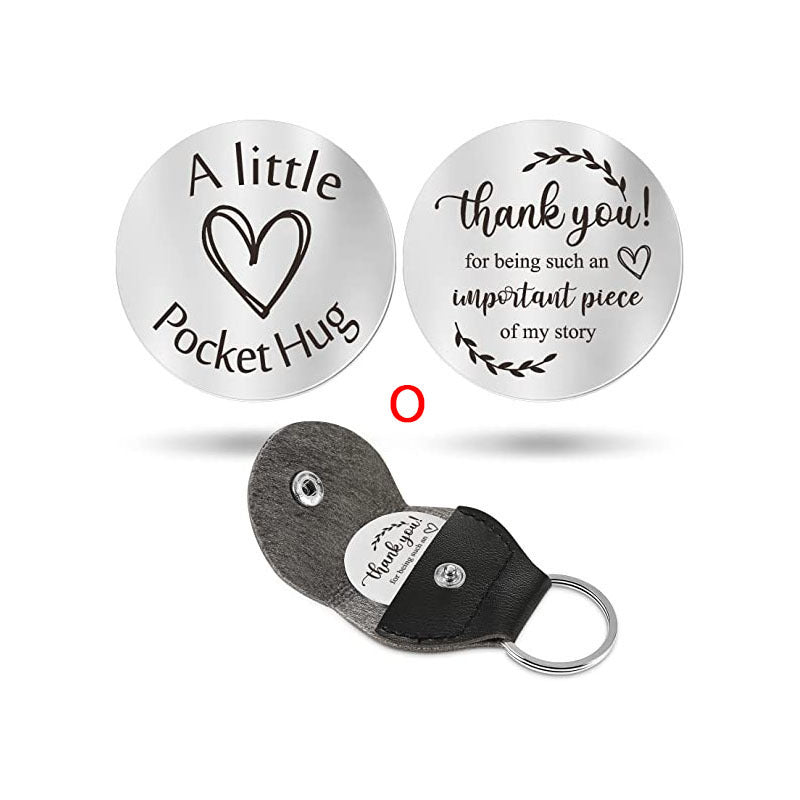 A small pocket Hug engraved key chain round stainless steel metal accessories