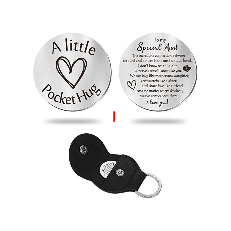 A small pocket Hug engraved key chain round stainless steel metal accessories