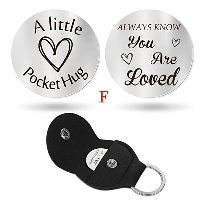 A small pocket Hug engraved key chain round stainless steel metal accessories