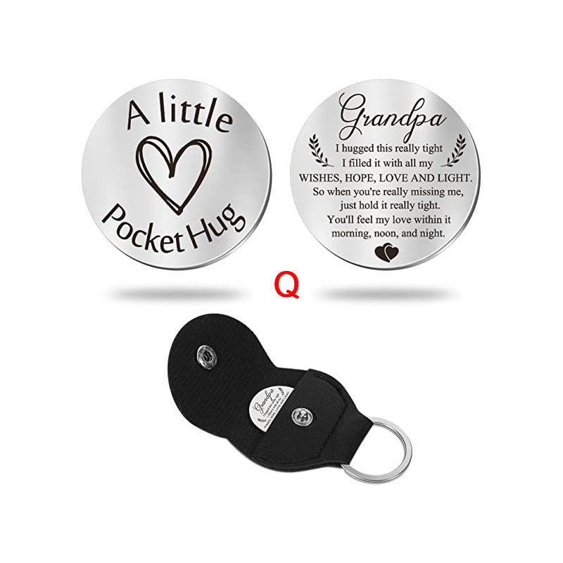 A small pocket Hug engraved key chain round stainless steel metal accessories