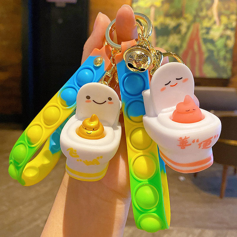 Creative Funny Squeeze Toilet String Clip Keychain Female Cartoon Car Key Chain Schoolbag Pendant Small Gift