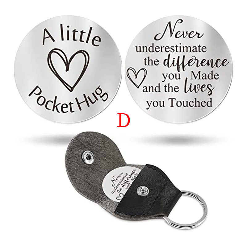 A small pocket Hug engraved key chain round stainless steel metal accessories